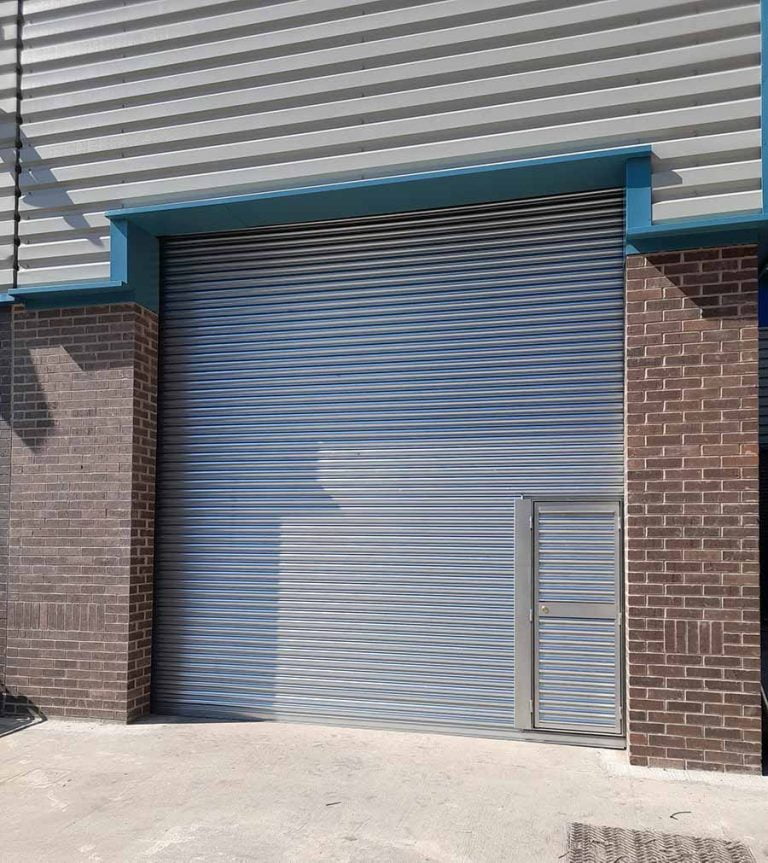 Industrial Warehouse Door With Personnell Door, West Yorkshire