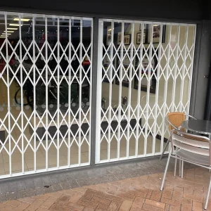 collapsible gates cafe front