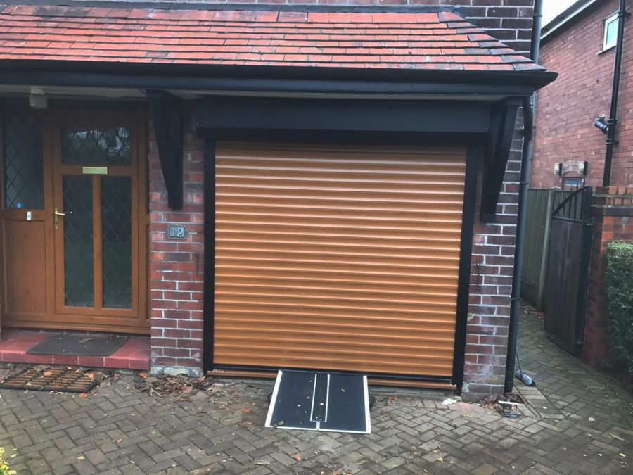 Manchester Domestic-Roller Shutter Golden Oak 77 mm Lath Garage Door